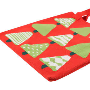 A red tote bag featuring green Christmas tree patterns and a logo. Ideal for festive occasions.