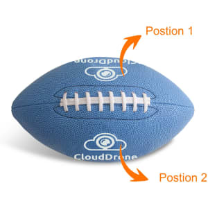 A blue American football with textured surface and white laces. It features a logo but the details are not specified.