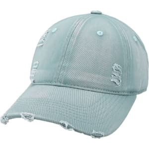 A vintage baseball cap in light blue with distressed detailing and a curved brim. It features a logo on the front.