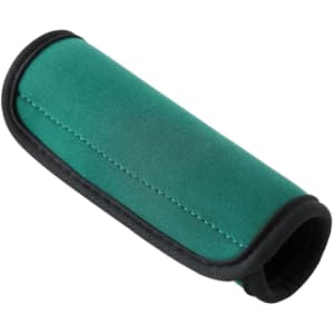 A neoprene luggage grip in green with black edges, designed for enhanced comfort and grip.