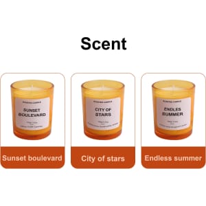 Three 3.5oz glass candles in amber containers, labelled "Sunset Boulevard," "City of Stars," and "Endless Summer."