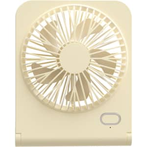 A mini desk fan in cream colour features a circular grille and a single button for operation.