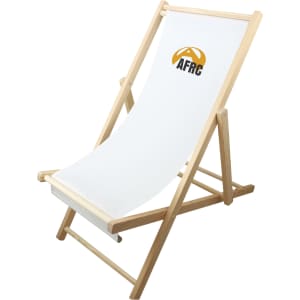 A beach chair with a beech frame and a white fabric seat, featuring a logo on the backrest.
