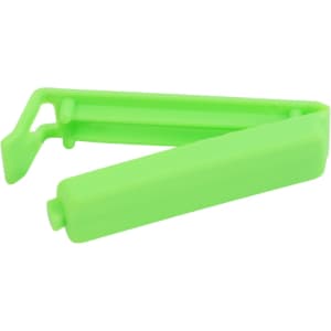 A green food bag seal clip designed to securely close packaging. It features a simple, ergonomic shape.
