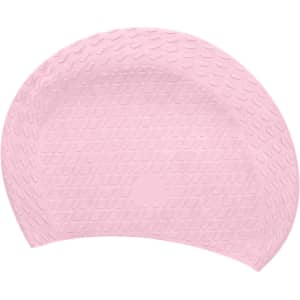 A premium silicone swimming cap in a soft pink shade featuring a textured surface and rounded shape.