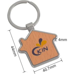 A wooden keyring shaped like a house with a silver keyring attachment and a logo on the front.