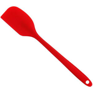 A red silicone spatula with a flat head and a long handle, featuring a hanging hole at the end.