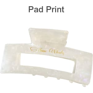 A translucent hair claw clip in a pearl finish, featuring a rectangular opening and a logo.