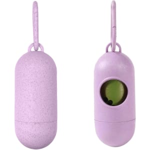 A purple eco-friendly pill-shaped pet waste bag dispenser with a hook attachment and an opening to access bags.