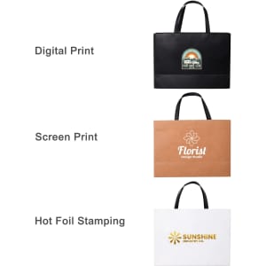 Three large paper bags with flat handles in black, brown, and white, featuring different print designs and a logo.