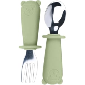 A green silicone and stainless steel kids cutlery set featuring a fork and spoon with bear-shaped handles.