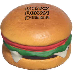 A hamburger-shaped stress reliever in brown, red, green, and white, featuring a logo on top.