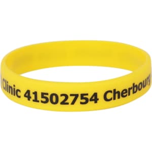 A yellow silicone wristband featuring black text and a logo, promoting a clinic in Cherbourg.