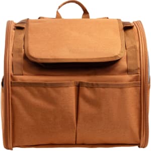 A pet backpack carrier in a warm brown colour featuring an expandable design and multiple front pockets.