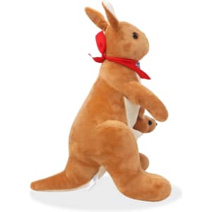 A plush kangaroo toy in tan colour, featuring a red scarf and a small joey peeking from its pouch.