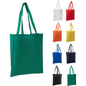 A green non-woven long handle bag with a V gusset, displayed among various coloured bags. Includes a logo.