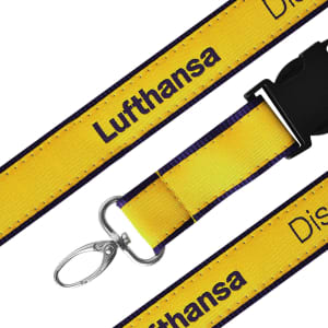 A detailed woven lanyard in yellow with a purple edge and a metal clasp. It features a branding logo.