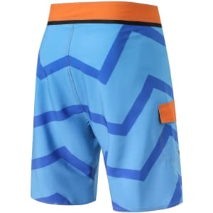 Knee-length men's swim shorts in blue with a zigzag pattern and an orange accent, featuring a pocket and a logo.