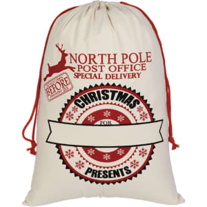 A cream flax linen drawstring bag with a festive red print featuring a reindeer and Christmas graphics.