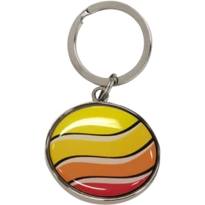 A custom shaped metal keyring with a domed epoxy finish, featuring yellow, orange, and red wave patterns.