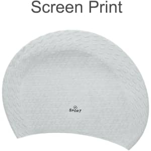 A silicone swimming cap in white with a textured surface and a small logo at the centre.