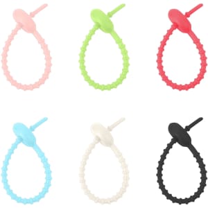 A set of six custom felt logo hanging tags in pink, green, red, light blue, white, and black. Each tag features a loop design.