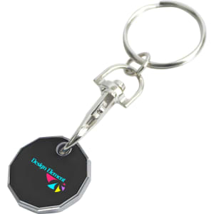 A silver keyring with a round, black trolley coin featuring a logo.