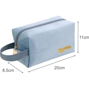 A soft blue cosmetic bag with a zipper closure and a handle, featuring a logo on the side.