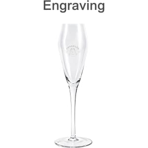 A tall, clear glass champagne flute with a tapered design and an engraved logo.