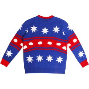 A unisex winter acrylic jacquard sweater in blue with red and white star and dot patterns on the back.