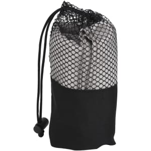 A quick dry towel in a black mesh storage bag, featuring a drawstring closure and sleek design.