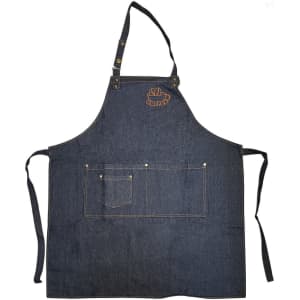 A denim full bib apron in deep blue, featuring a neck strap and front pockets, with a logo design.