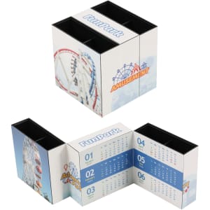 A three-panel foldable pen holder in white, featuring images of an amusement park and divided into sections.