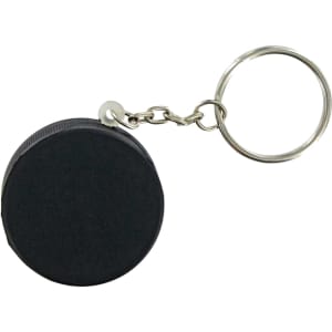 A keyring featuring a black hockey puck stress reliever with a metal chain attached.