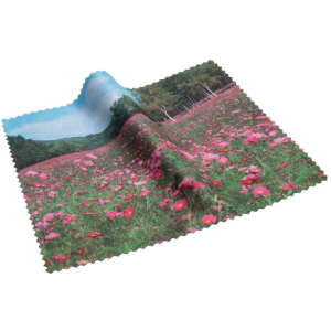 A microfibre lens cloth featuring a vibrant landscape of pink flowers against a green backdrop. The cloth has a branded logo.