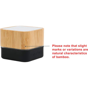 A bamboo Bluetooth wireless speaker featuring a black base and a textured top, showcasing natural bamboo variations.