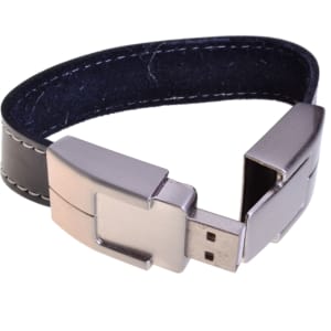 A leather bracelet flash drive featuring a metallic clasp. The bracelet has a black leather strap and silver accents.