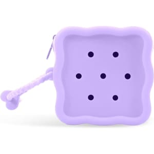 A square silicone pouch in lavender, featuring six holes and a textured zipper pull. Includes a logo.