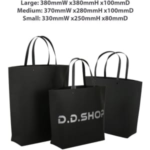 A large black boutique paper bag with two handles, featuring a logo and dimensions of 380 x 380 x 100mm.