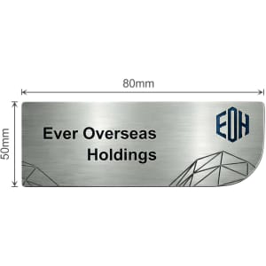 A custom metal name badge with a brushed silver finish and a logo. Dimensions are 80mm by 50mm.