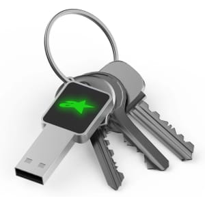 A square flash drive in silver, attached to a keyring with three metal keys, featuring a green logo.