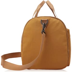 A foldable travel duffle bag in a warm mustard colour with a sturdy strap and top handles. Features a hook closure and branding.