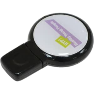 A round domed black flash drive with a glossy surface and a white circular area, featuring a logo.