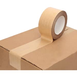 A roll of self-adhesive reinforced kraft paper tape in a natural brown hue, placed on a kraft cardboard box.