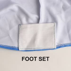 A close-up of a white and blue tablecloth featuring a foot set section. It includes a logo.