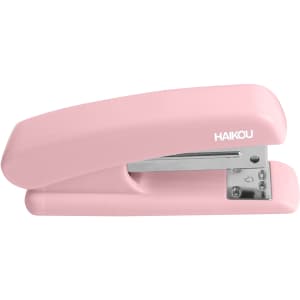 A pink stapler with a silver base, featuring a logo. It holds 1000 staples and is designed for office use.