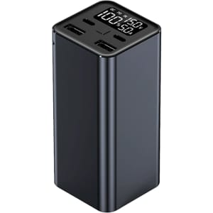A black power bank with two USB ports and a digital display on top, featuring a sleek rectangular design.