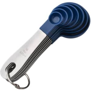 A set of measuring spoons in blue and stainless steel, neatly organised on a metal ring.