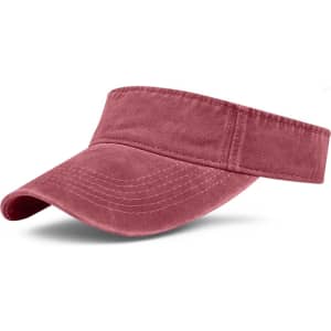 A washed sun visor in a muted rose colour with a wide brim and soft fabric. It features a logo on the band.