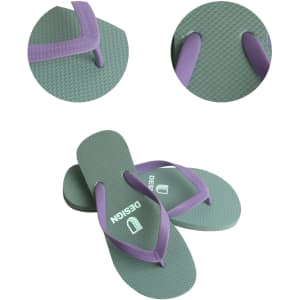 A pair of green and purple rubber thongs with a textured footbed and branding on the straps.